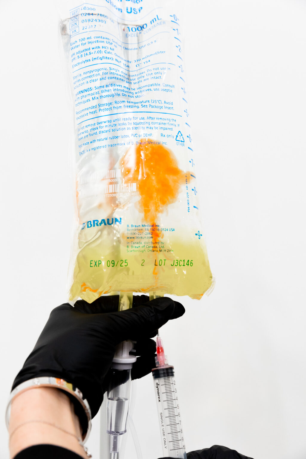 IV therapy nurse in London administering wellness drip